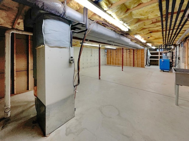 basement featuring heating unit