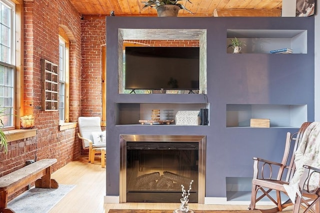 1511 Main St Unit C406, Worcester, MA 01603 - living room with brick wall, wood ceiling, and wood finished floors