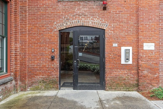 1511 Main St Unit C406, Worcester, MA 01603 - doorway to property featuring brick siding