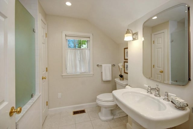 15 Edmonds Rd Unit 15, Concord, MA 01742 - bathroom featuring toilet, lofted ceiling, tile patterned floors, a sink, and baseboards