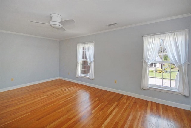 15 Edmonds Rd Unit 15, Concord, MA 01742 - empty room with plenty of natural light, light wood-style floors, baseboards, ornamental molding, and a ceiling fan