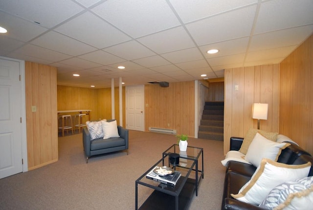 15 Edmonds Rd Unit 15, Concord, MA 01742 - living room with a baseboard radiator, stairs, recessed lighting, wood walls, and carpet floors