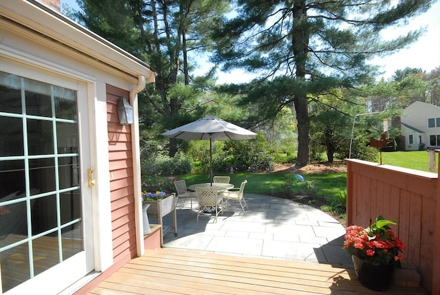 15 Edmonds Rd Unit 15, Concord, MA 01742 - deck with outdoor dining space, a patio area, and a yard
