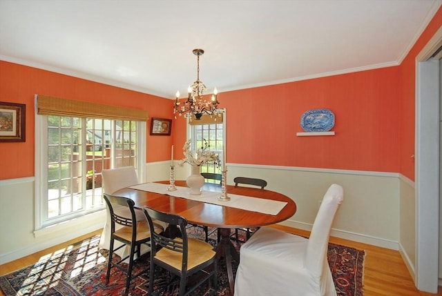 15 Edmonds Rd Unit 15, Concord, MA 01742 - dining room featuring a chandelier, wood finished floors, ornamental molding, and baseboards
