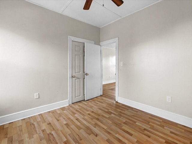 unfurnished room with light hardwood / wood-style flooring and ceiling fan