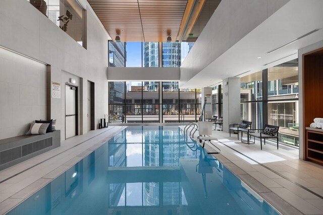 community pool with a city view