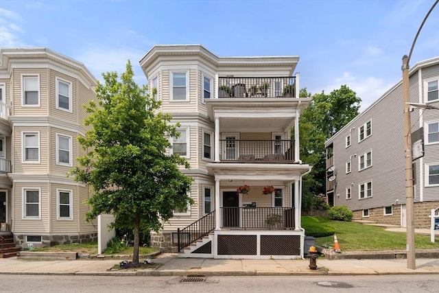 574 Ashmont St Unit 1, Boston, MA 02122 - view of property featuring a balcony and a porch