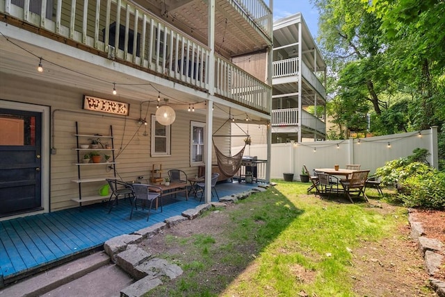 574 Ashmont St Unit 1, Boston, MA 02122 - rear view of property with outdoor dining space and a wooden deck