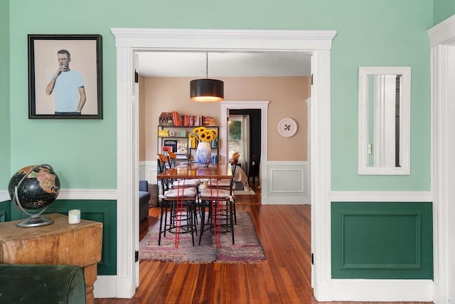 574 Ashmont St Unit 1, Boston, MA 02122 - dining space featuring a wainscoted wall and wood finished floors
