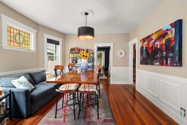 574 Ashmont St Unit 1, Boston, MA 02122 - dining space with dark wood-style flooring and a wainscoted wall