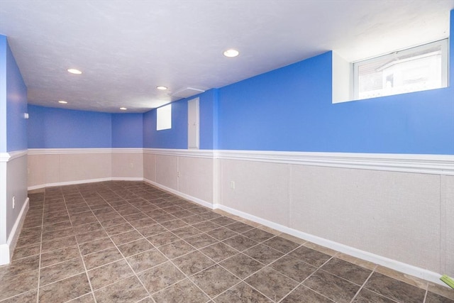 finished below grade area featuring recessed lighting