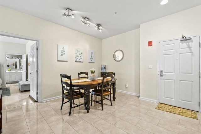 38 Village Rd Unit 309, Middleton, MA 01949 - dining room with light tile patterned floors and baseboards