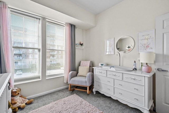 38 Village Rd Unit 309, Middleton, MA 01949 - living area with carpet floors and baseboards