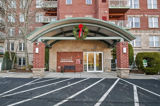 38 Village Rd Unit 309, Middleton, MA 01949 - view of building exterior with uncovered parking