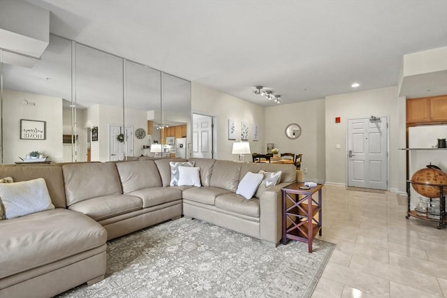 living room featuring light tile patterned flooring