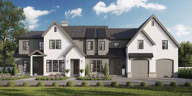 modern inspired farmhouse featuring board and batten siding, a garage, driveway, and a chimney