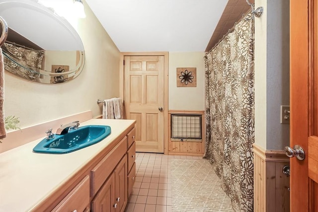 full bath with vanity and tile patterned floors