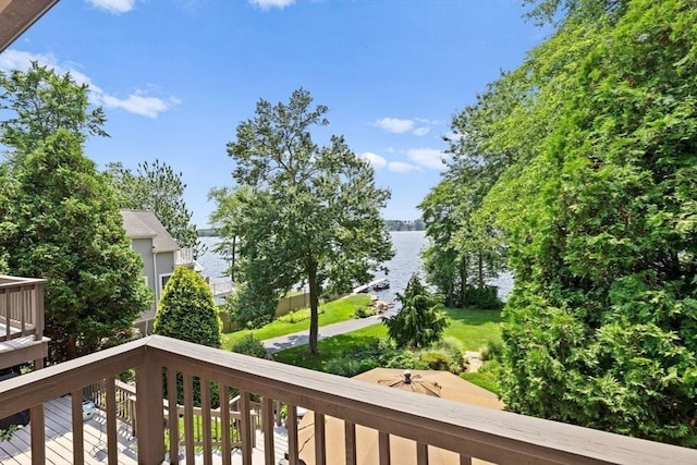 balcony featuring a water view