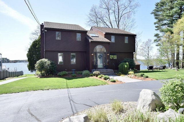 view of front facade with a front lawn