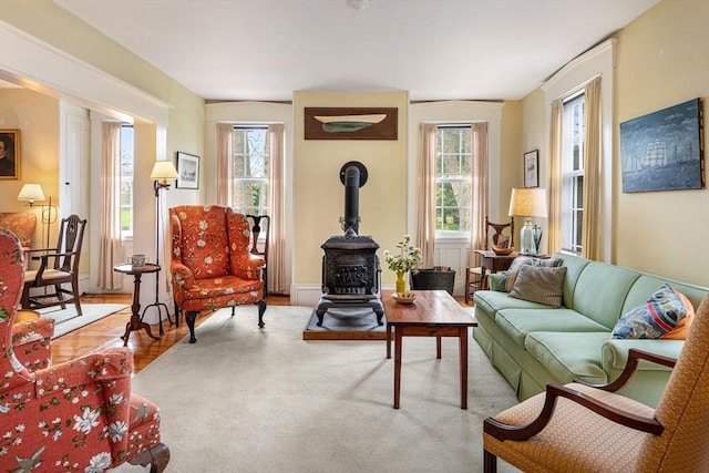 167 Bakerville, Dartmouth, MA 02748 - living room featuring a wood stove and wood finished floors