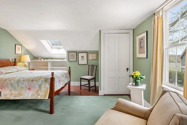 167 Bakerville, Dartmouth, MA 02748 - carpeted bedroom with a skylight, multiple windows, baseboards, and lofted ceiling