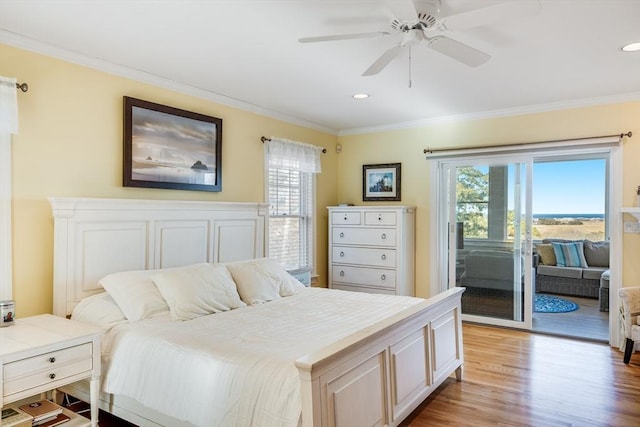 bedroom featuring ceiling fan, light wood-style flooring, ornamental molding, and access to outside