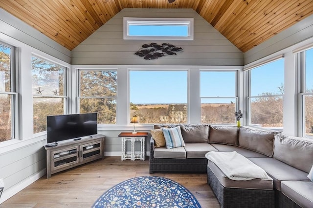 sunroom with wood ceiling and vaulted ceiling