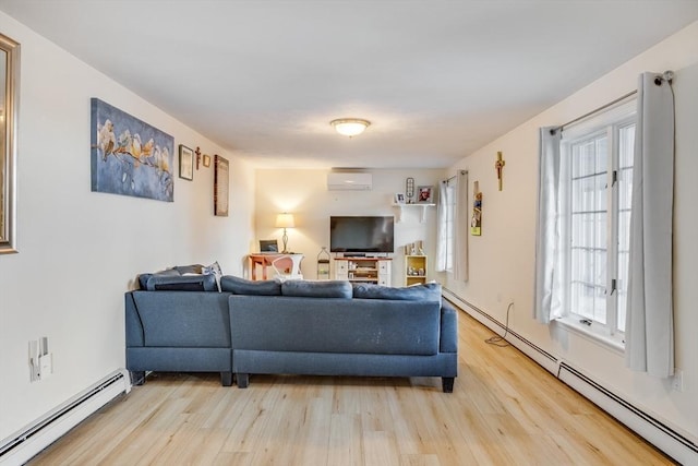 living area featuring light wood-type flooring, a baseboard radiator, and a wall mounted AC