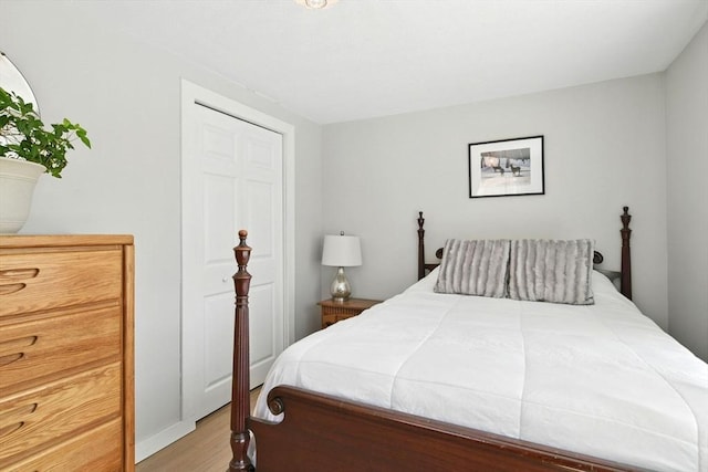 bedroom with light wood-style floors