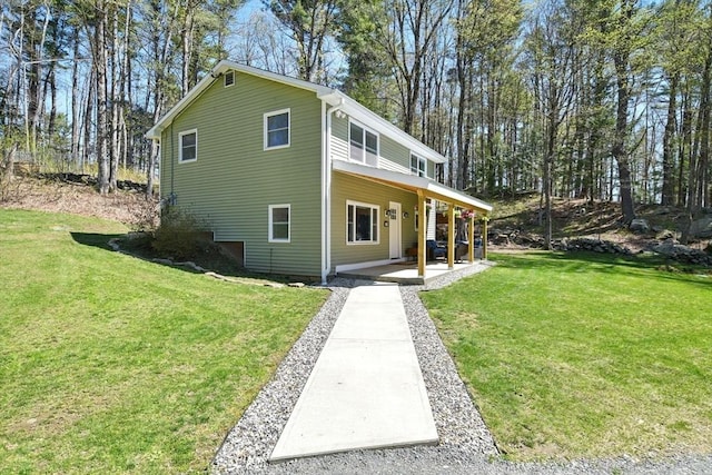 view of front of home featuring a porch and a front yard