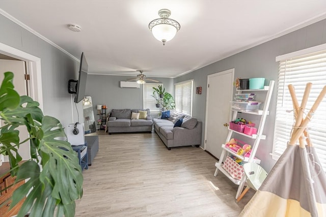 1001 Belleville Ave, New Bedford, MA 02745 - living area featuring ornamental molding, light wood-style flooring, a wall mounted AC, and a ceiling fan