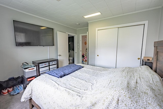 1001 Belleville Ave, New Bedford, MA 02745 - bedroom featuring crown molding and a closet
