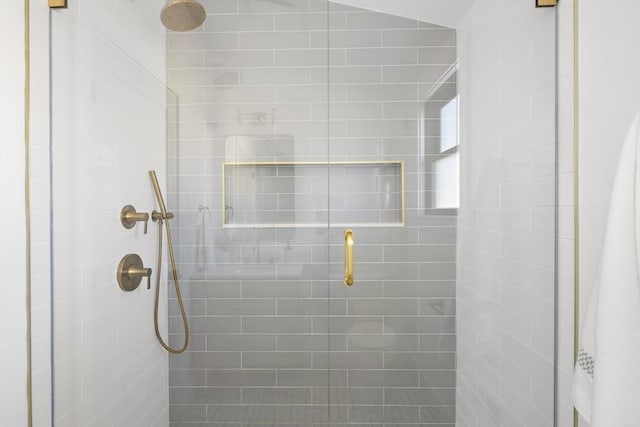 bathroom featuring an enclosed shower