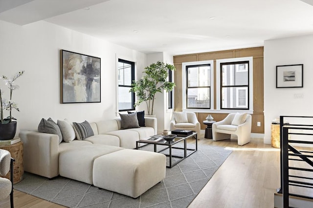 living room with light hardwood / wood-style flooring