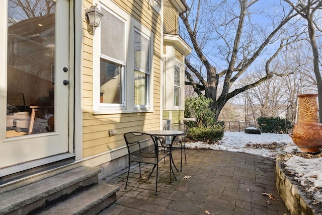 view of snow covered patio