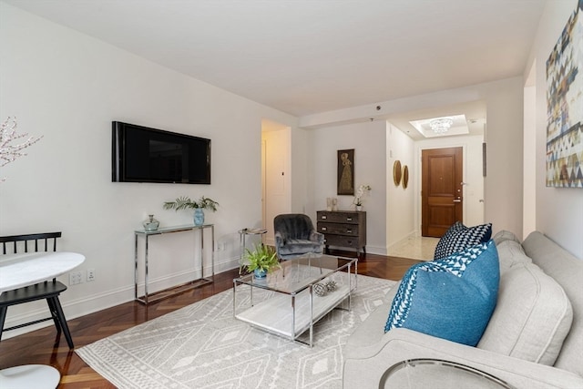 living room featuring parquet floors