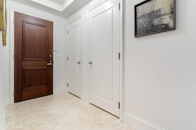 interior space with light tile patterned floors