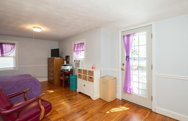 interior space with light wood-style floors and baseboards