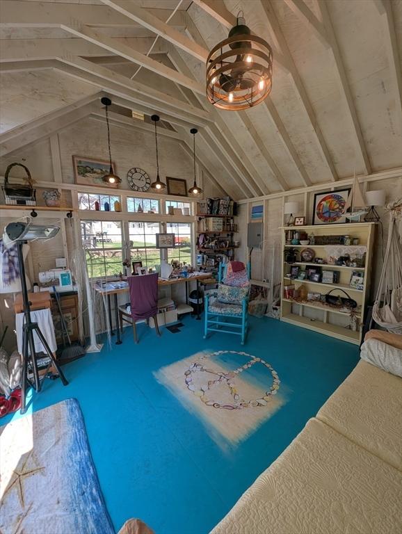 interior space featuring vaulted ceiling