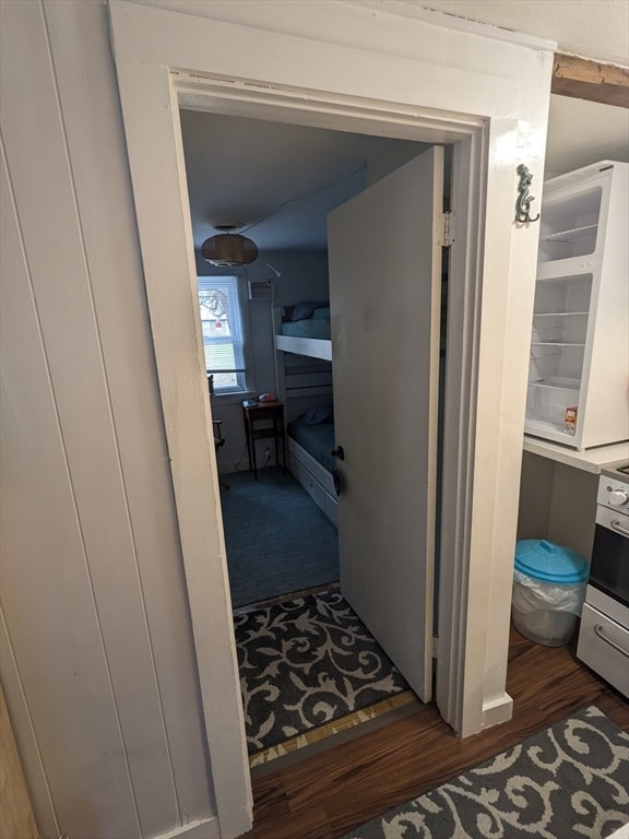 hallway featuring dark hardwood / wood-style floors