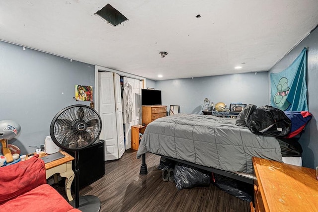 bedroom featuring wood finished floors