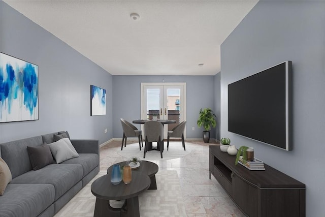 living area with french doors and baseboards