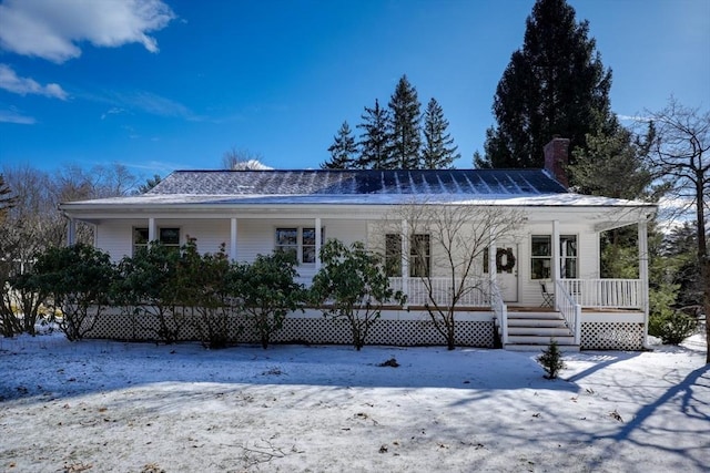 view of front of property featuring covered porch