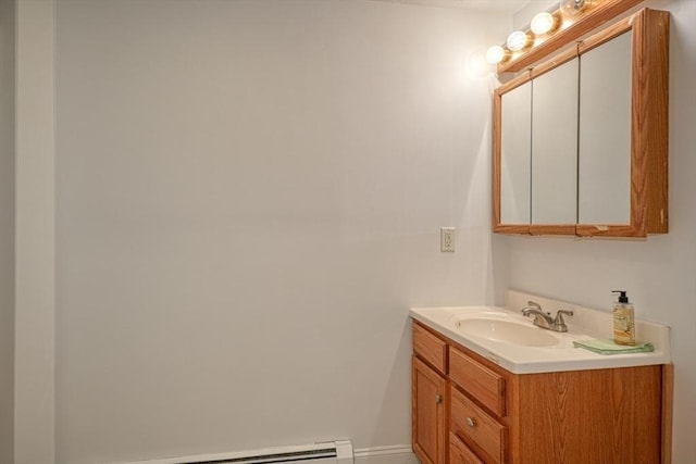 bathroom featuring vanity and a baseboard heating unit