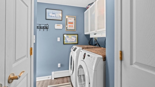 7 Grove St, Fairhaven, MA 02719 - laundry room featuring cabinet space, washer and dryer, and wood finished floors