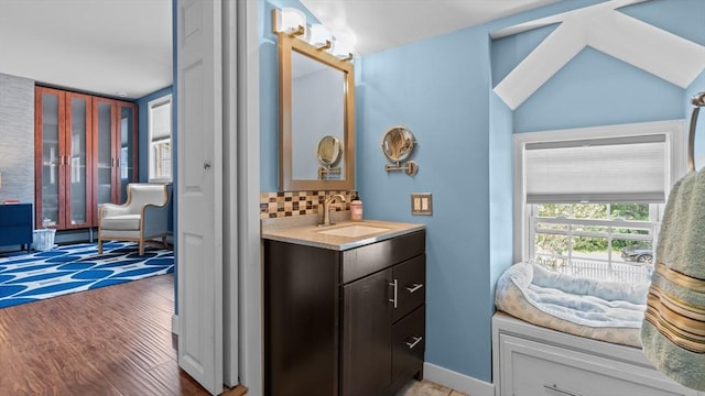 7 Grove St, Fairhaven, MA 02719 - bathroom featuring vanity, wood finished floors, and backsplash
