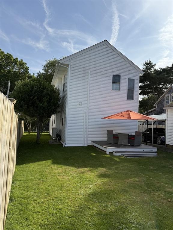 7 Grove St, Fairhaven, MA 02719 - back of house with a wooden deck