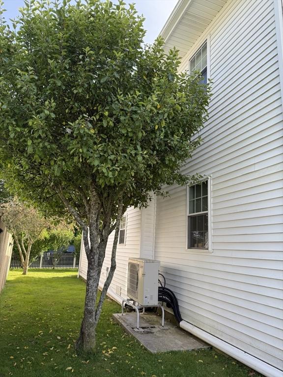 7 Grove St, Fairhaven, MA 02719 - view of side of property with an ac unit