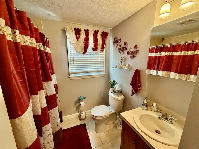full bath featuring a textured ceiling, tile patterned floors, toilet, vanity, and curtained shower