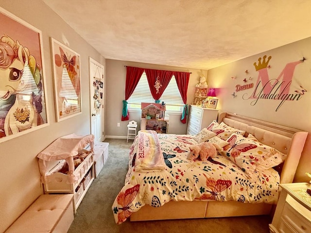 carpeted bedroom with baseboards